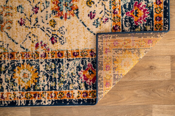 A specially designed carpet detail with one end folded.