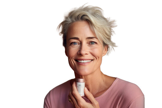 Beautiful smiling woman aged 50 model with natural makeup clean face beige warm background holding cream bottle, isolated, png, Canva