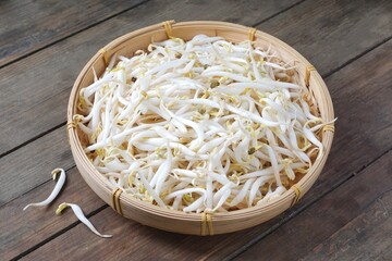 A pile of fresh bean sprouts, or taugeh from mung beans. Made from sprouting beans, it is a common ingredient in Asian cuisine.