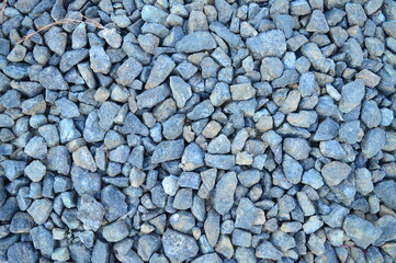 A close up of a gravel with the word rock on it