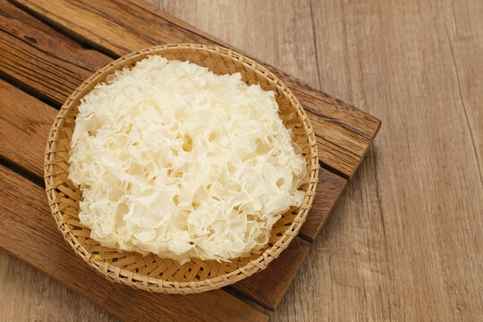 Fresh White Fungus or Snow Fungus (Tremella fuciformis) served on bamboo plate
