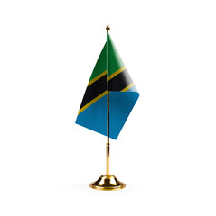 Small national flag of the Tanzania on a white background