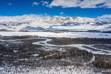 Fototapeta na wymiar Altai mountains in winter. Kurai ridge. Aerial view.
