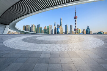 Empty square floor and city skyline with modern buildings in Shanghai, China.