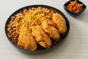 Korean instant noodles with fried chicken or Fried chicken ramyeon