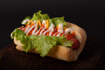 Delicious hotdogs with lots of sauce and meat