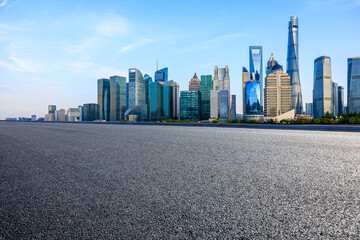 Fototapeta na wymiar Asphalt road and city skyline with modern buildings in Shanghai, China.