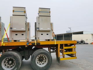 generator transformers strapped on a truck