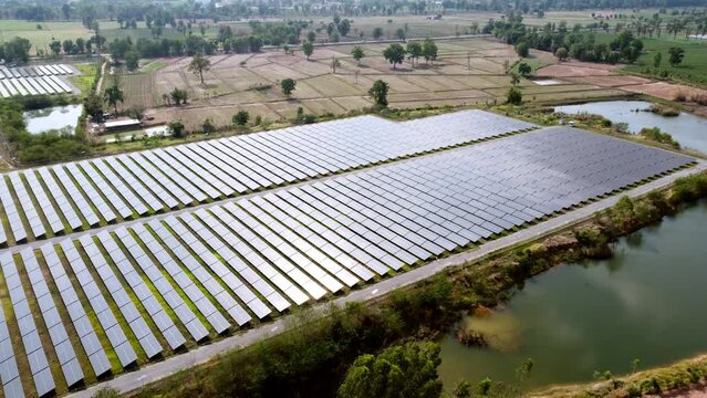 Solar electrical produce is infrastructure and modern technology. Aerial view flying over vitality sustainable environment force. Photovoltaic solar cells farm industrial for renewable energy power.