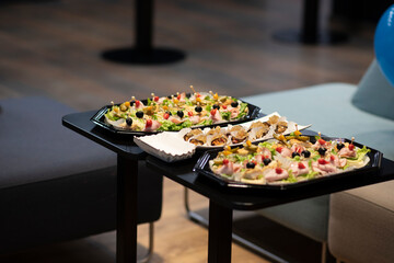 Different types of one bite snacks. Blurred areas of the photo.