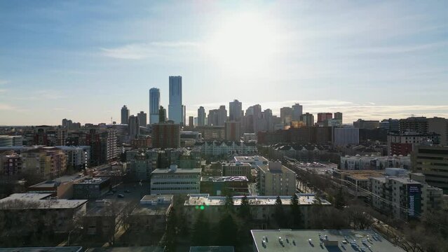 Drone reveal shot of downtown in the morning sun on a cold spring day