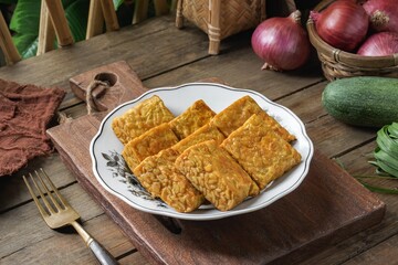 Fried Tempeh or Tempe is a traditional Malay dish snack popular in Malaysian, Indonesian, and Singapore