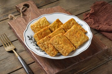 Fried Tempeh or Tempe is a traditional Malay dish snack popular in Malaysian, Indonesian, and Singapore