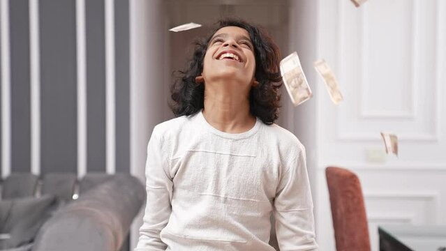 Rich Indian Kid Teenage Boy Throwing Money In Air To Show Off