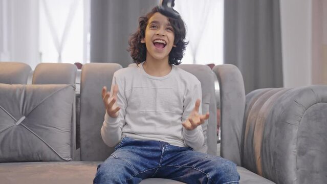 Indian teenage boy wins a video game match