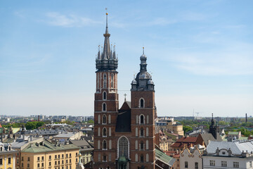 St. Mary's Basilica in Krakow, Poland. Aerial view of Main Market Square in the Old Town district of Cracow. Bazylika Mariacka or Kościół Mariacki Church Kraków.