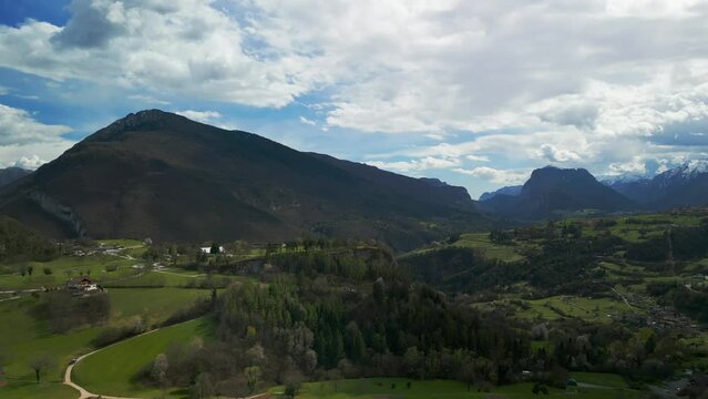 Aerial panoramic view of Dolomites mountains range from San Lorenzo in Banale village in Trentino Alto Adige, Italy