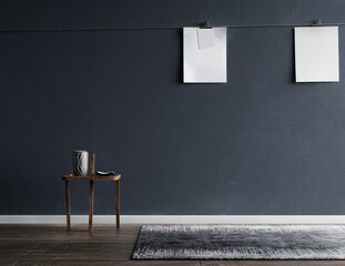 Gray wall in an empty room with a photo frame, wooden floor with carpet, and side table on floor