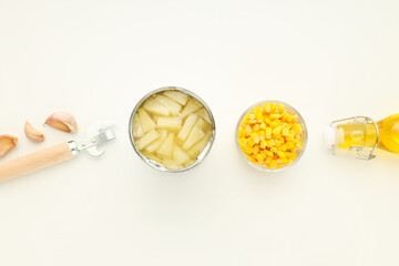 Ingredients for cooking salad with canned pineapple on white background