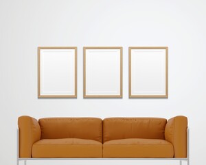 3 vertical picture frame mockup over a tan leather couch