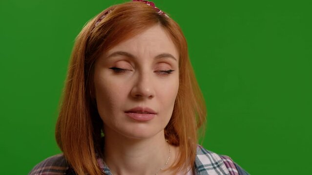 Woman amazed while looking around being bit scared in studio isolated on a background mockup. Female getting acquaintanted with surroundings.