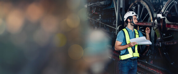 Engineer railway wearing safety uniform and helmet under checking under train ,wheels and control system for safety travel passenger. Banner cover design.