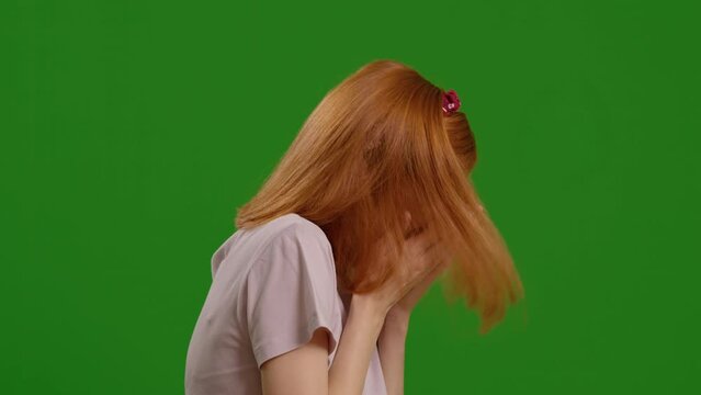 Green Screen background and woman side view sneezing. Unwell female having pain in nose of exposed herself to allergens.