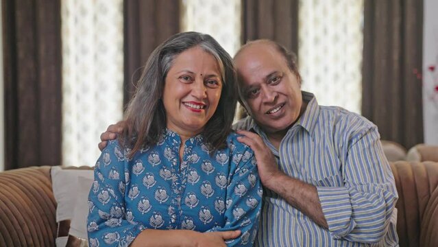 Happy Indian old couple smiling