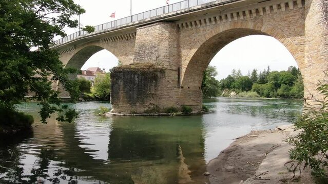 on the bank of the bridge