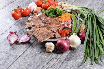 Meat Doner with pita, Bulgur pilaf, onion and grilled vegetables