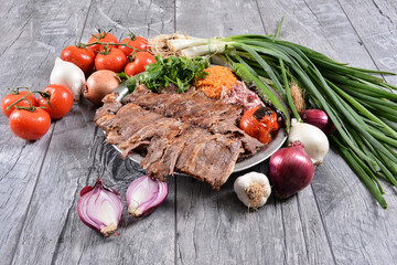Meat Doner with pita, Bulgur pilaf, onion and grilled vegetables