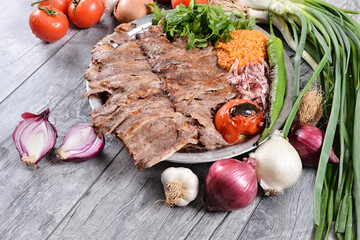 Meat Doner with pita, Bulgur pilaf, onion and grilled vegetables
