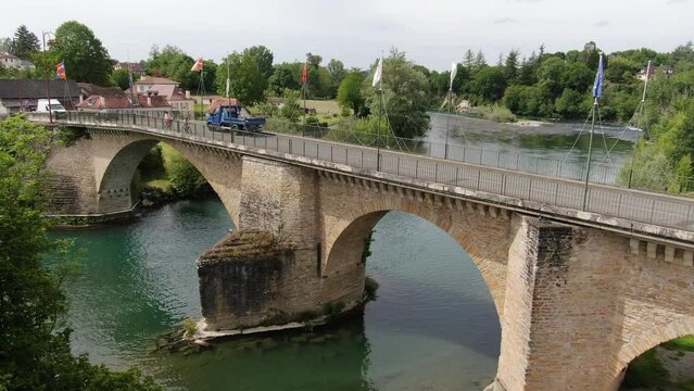 Stationary Plan of Bridge Passersby Over the River