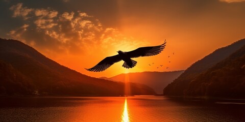 Fototapeta na wymiar Silhouette of bird flying on sunset background with river and mountain landscape. Generative AI