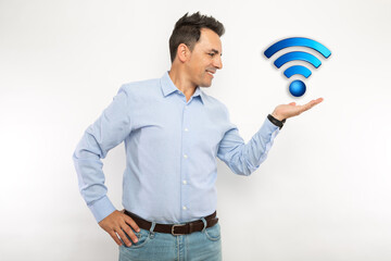 Happy man showing Wi Fi logo