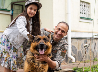 Soldier reunited with his daughter.