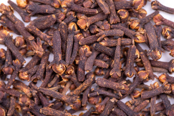 Clove. Dried Clove on wooden background. Spices concept. food background. Top view