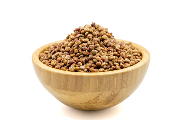 Sumac seeds. Dried sumac berries isolated on white background. Spice concept