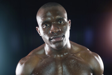 Fototapeta na wymiar Fitness, body builder and portrait of black man with sweat on dark background for workout, exercise and training. Sports, muscle and face of serious male person with dedication, motivation and focus