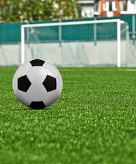 Black and white Soccer ball on grass field