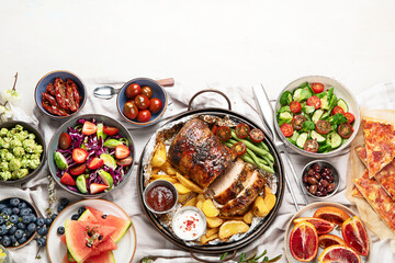 Family dinner or lunch. Many dishes on the table. Top view, copy space