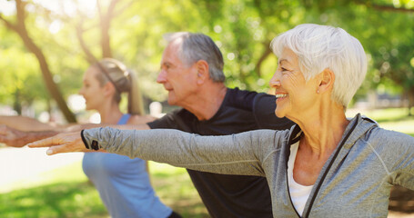 Yoga, fitness and an old couple with their personal trainer in a garden for a health or active...