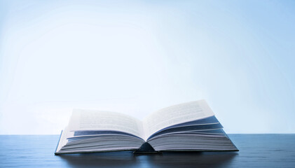 Open book on white background