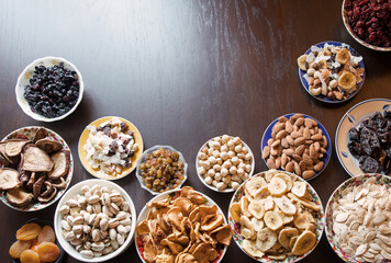 Nuts, seeds and dried fruits on the table