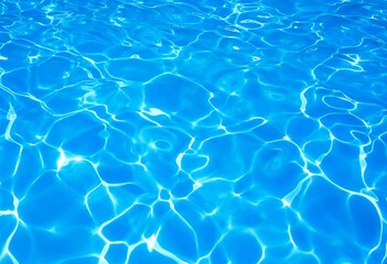 Fototapeta na wymiar abstract blue and bright water surface in swimming pool. Beautiful natural summer background