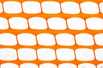 Texture of holes on orange background