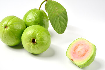 Pink guava fruits isolated on white background.Guava fruit with leaf isolated on white background.Thai Pink guava fruits isolated on white background.Copy Space.Copy Text.