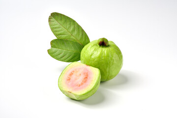 Pink guava fruits isolated on white background.Guava fruit with leaf isolated on white background.Thai Pink guava fruits isolated on white background.Copy Space.Copy Text.