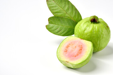 Pink guava fruits isolated on white background.Guava fruit with leaf isolated on white background.Thai Pink guava fruits isolated on white background.Copy Space.Copy Text.