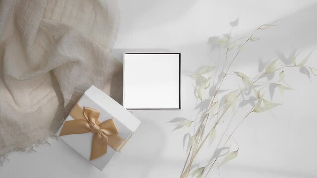 Video 5x5 card mockup in gift box with dry flowers